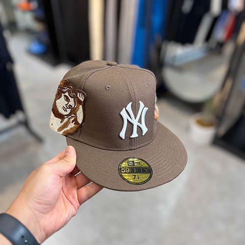 کلاه کپ فیت بک نیو ارا (NEW ERA NY) شکلاتی فرشته سایز (1/8)7 (56.8 CM)